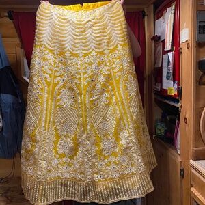 Yellow lehenga with blouse and dupatta